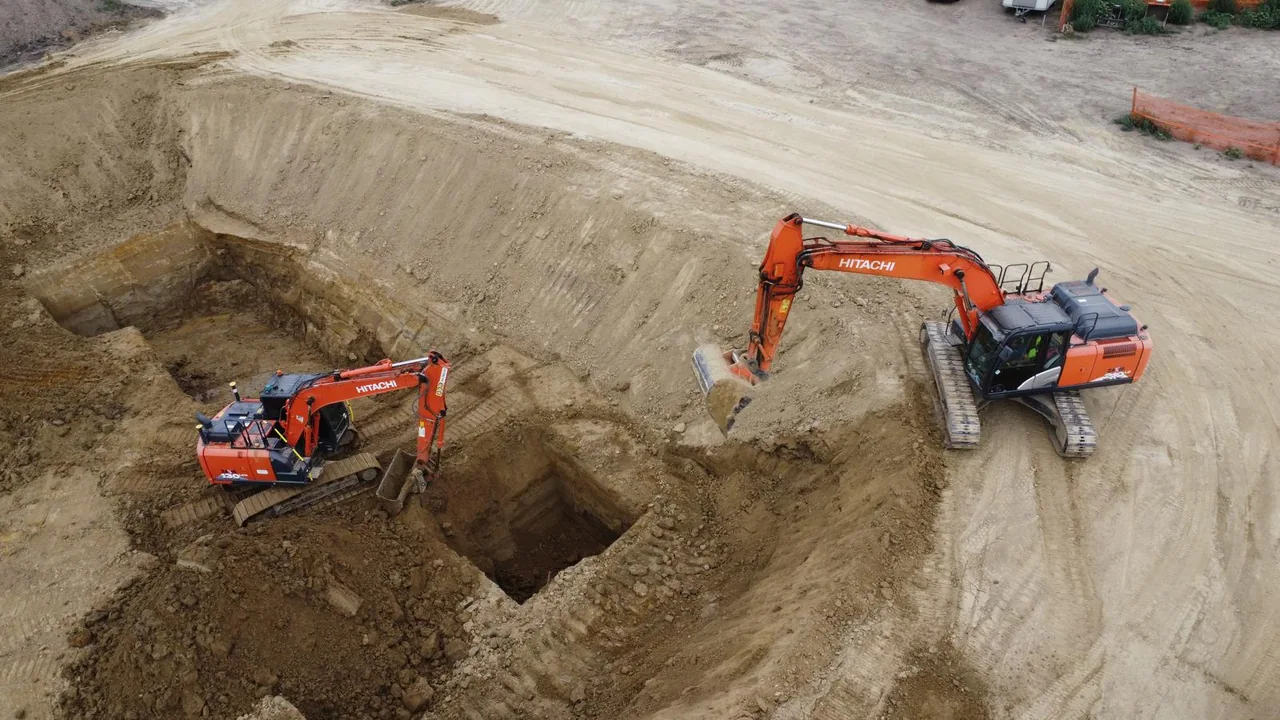 Two excavators working on the Beavers irrigation project in Jimbolia